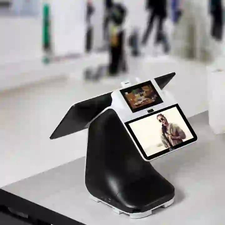 PAX Technology desktop payment kiosk with triple screens.