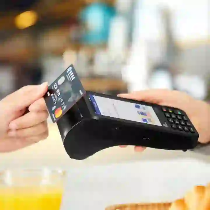Merchant accepting PayWave from customer.